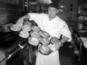 Lawry's The Prime Rib, Dallas, cook Juan Flores with Yorkshires fresh from the oven.